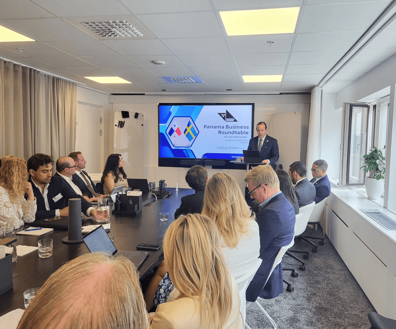 Panama Business Roundtable: Panama's Minister of Foreign Affairs, Javier Martínez-Acha, speaks at a lectern to guests around a conference table